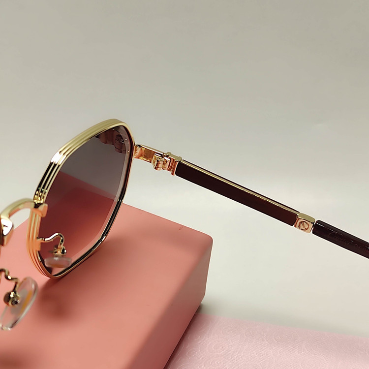 عکس محصول عینک افتابی زنانه فلزی فانتزی cartier 2703